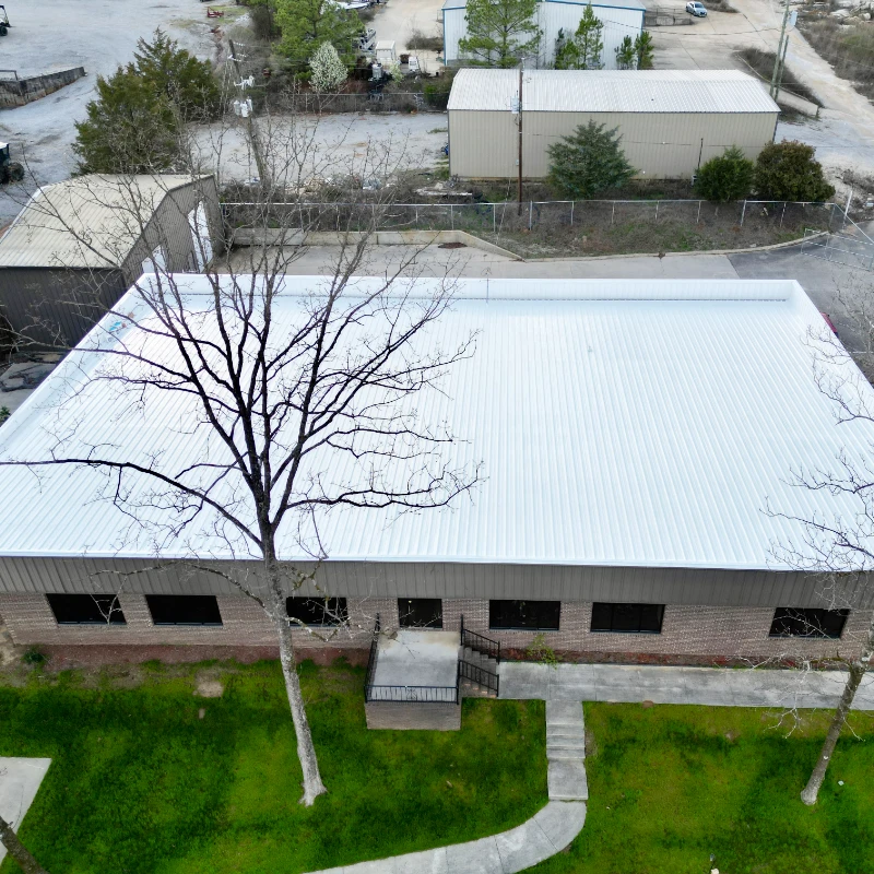 Commercial roof after a white coating system was installed